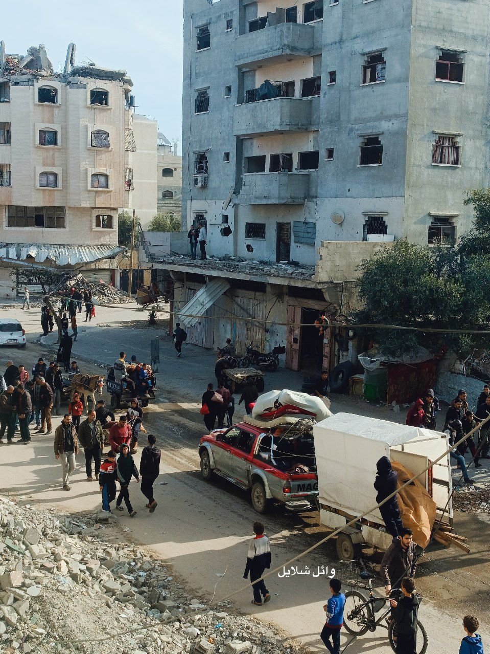 Displaced Palestinians return to Nuseirat camp homes as ceasefire takes effect