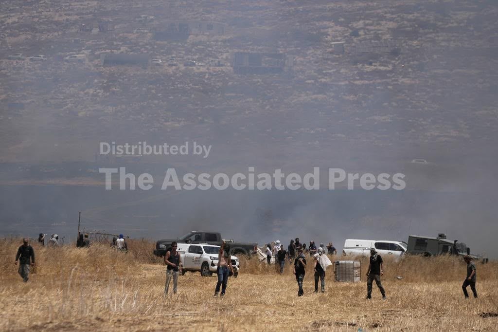 Israeli settlers burn Palestinian farmland, attack residents in Beit Furik