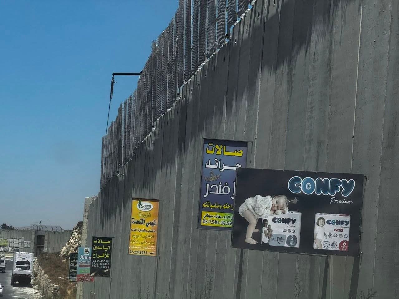 Israeli forces install iron fence on segregation wall near Al-Ram