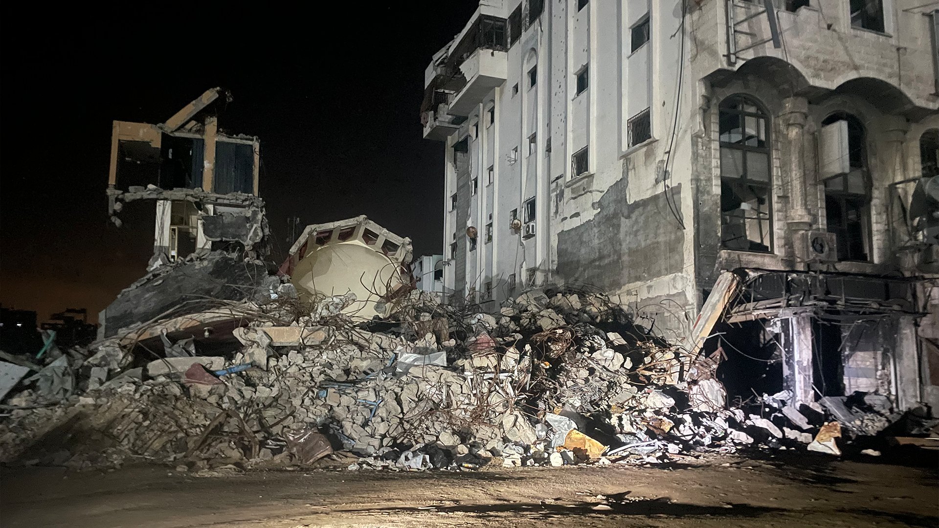 Eyewitness describes seeing their wrecked building in Gaza