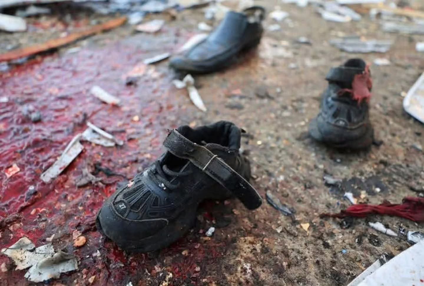 Blood-soaked children’s shoes witness massacre at Gaza Port