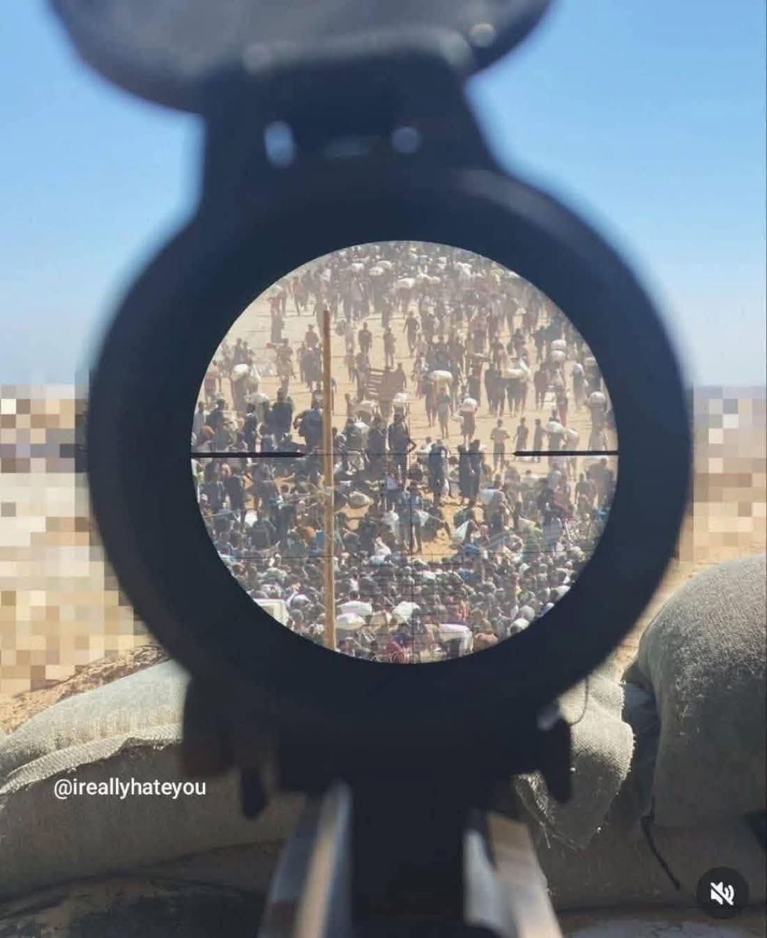 Israeli soldier aims weapon at civilians seeking food in Gaza famine