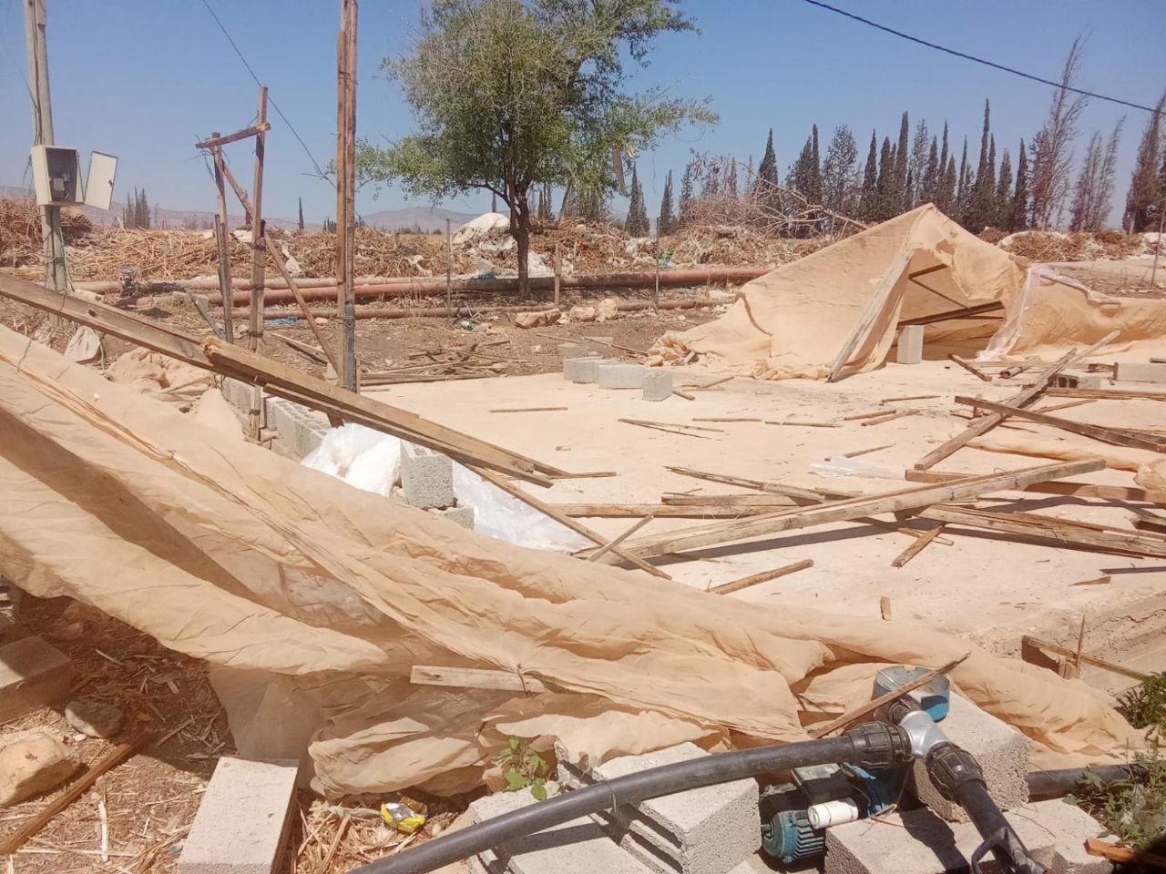 Palestinian forced to demolish own structures in Jordan Valley