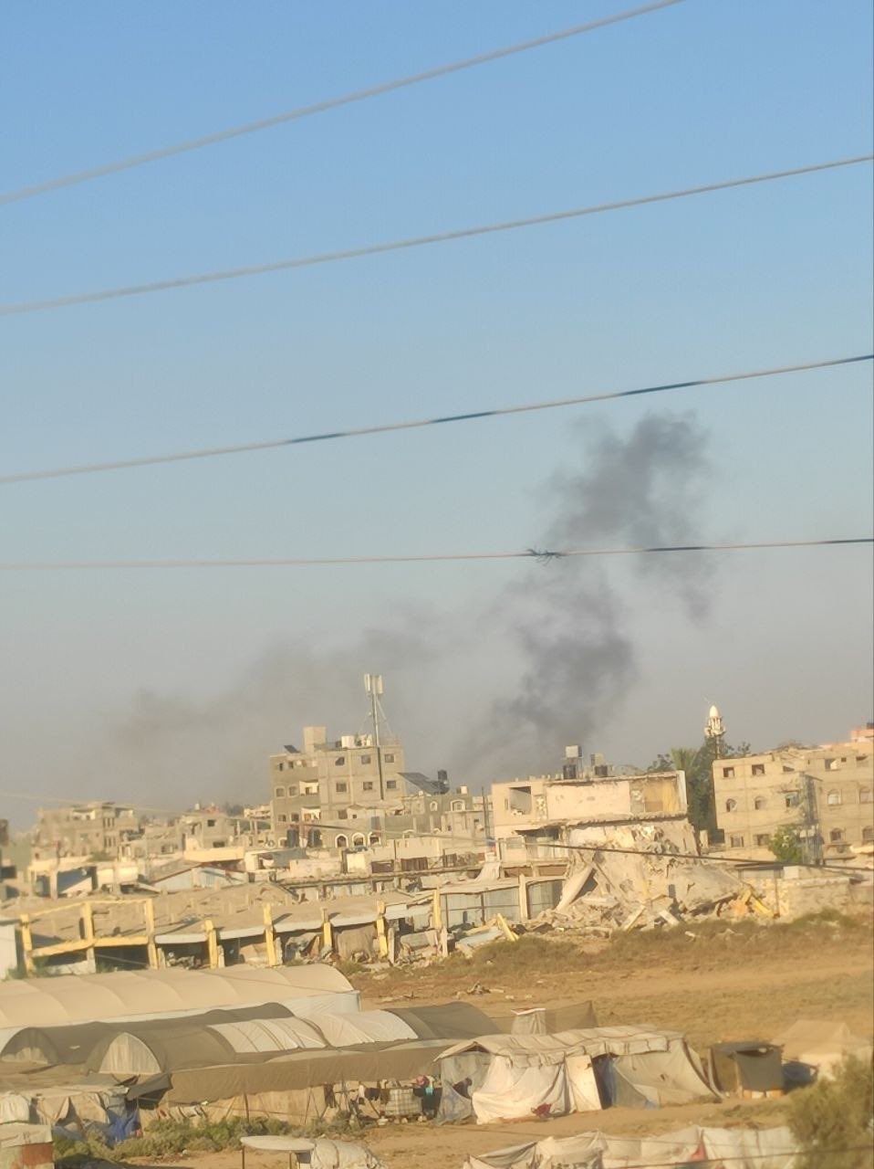 Israeli aircraft bombard residential building in Al-Bureij camp, Gaza