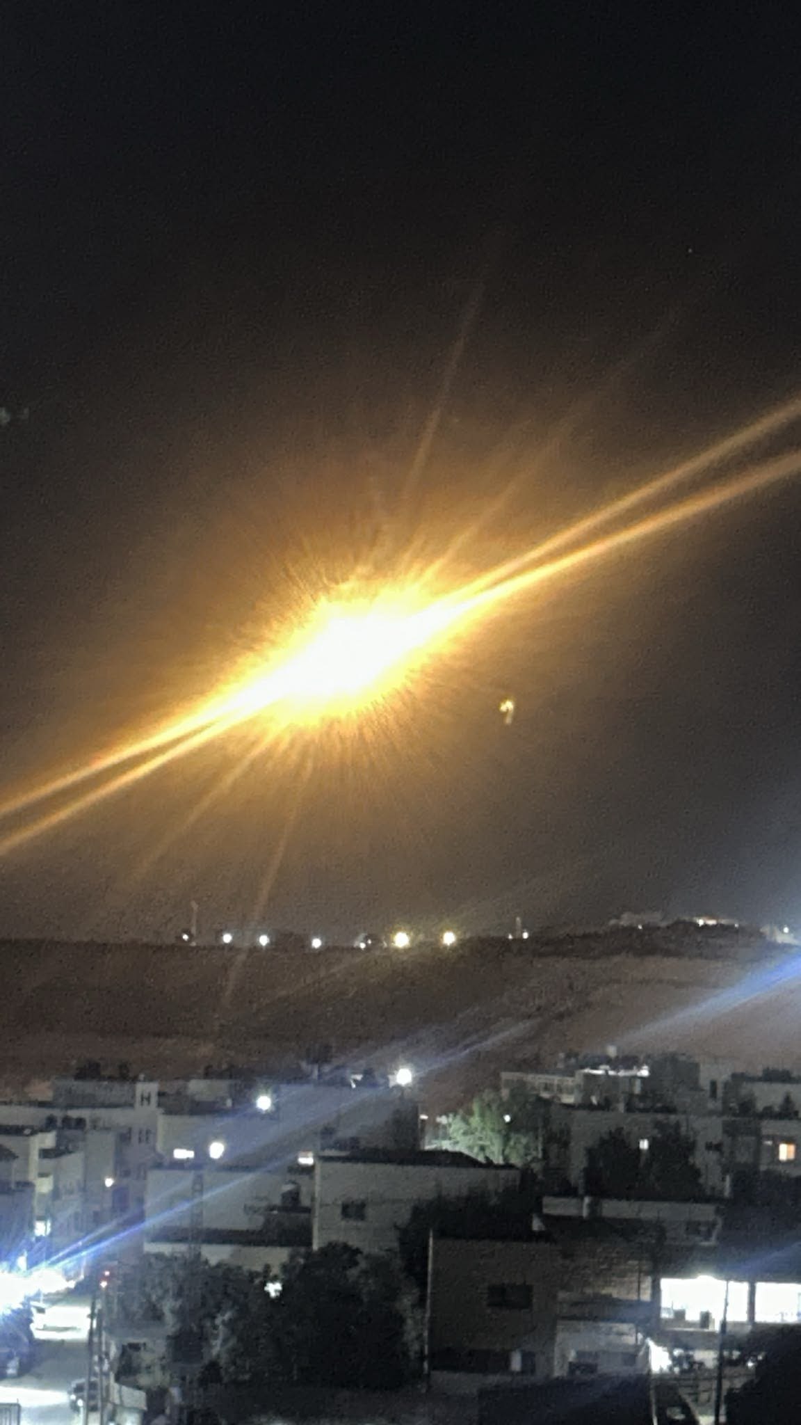 Israeli forces fire flares over Al-Kasarat near Qalandia camp
