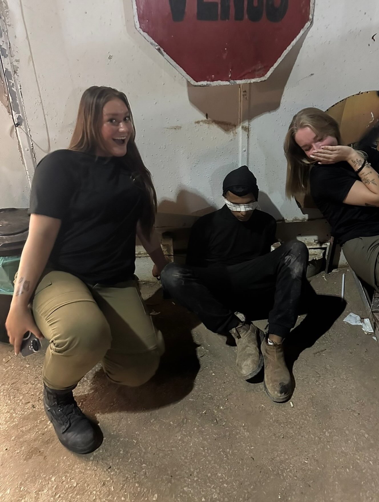 Israeli female soldiers mock bound blindfolded Palestinian detainee