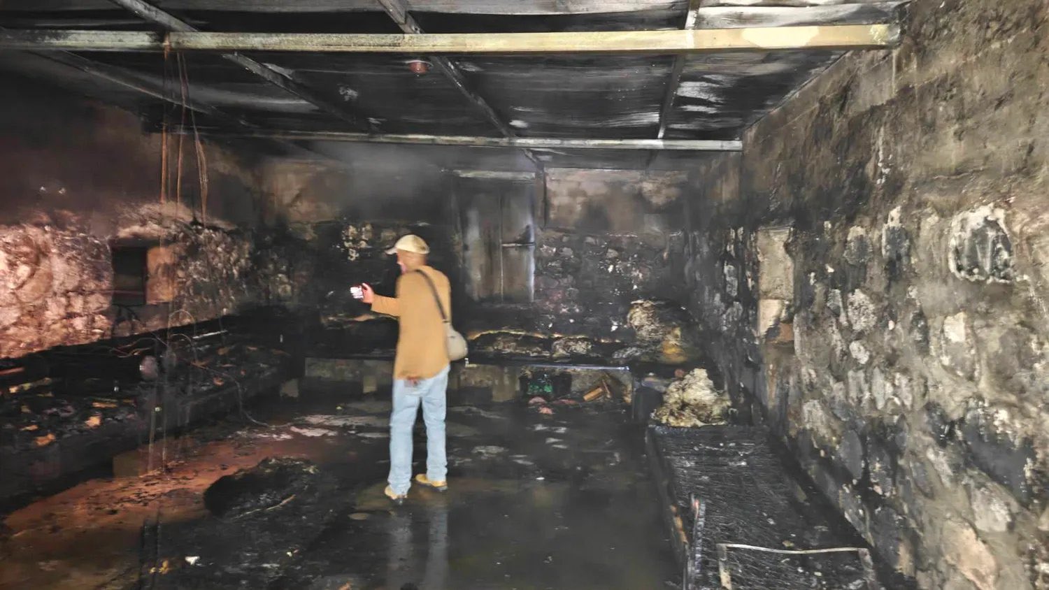 Homes burned in West Bank with families inside