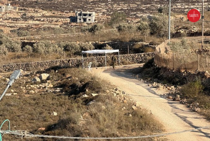Palestinian Loai Ridi under settler siege in Qusra