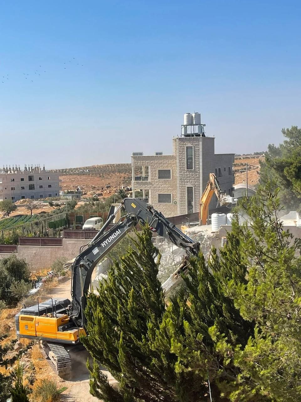 Israeli bulldozers demolish Kawazbeh family home in Al-Maniya, Bethlehem