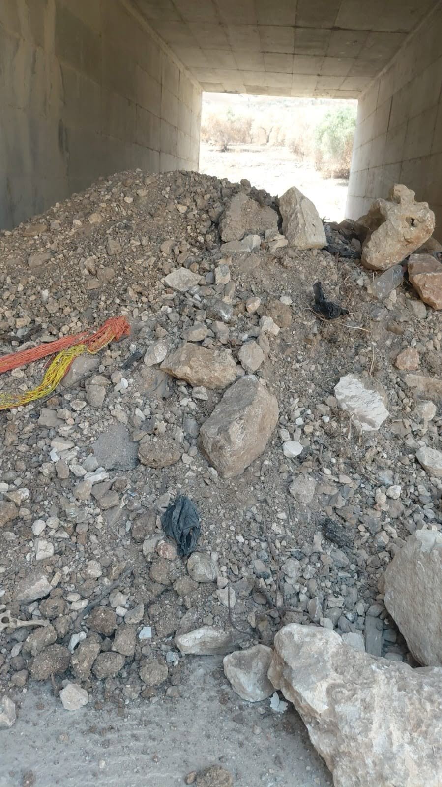 Israeli settlers block Palestinian home entrance in Burin, West Bank