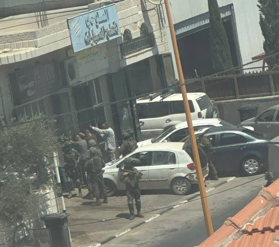 Israeli soldiers search Palestinians during Silwad raid in West Bank