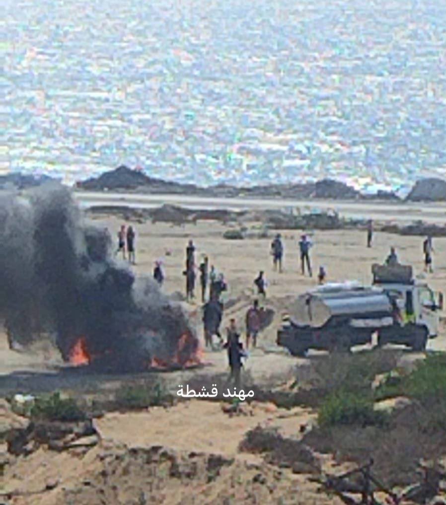 Civilian water truck extinguishes fire from Israeli airstrike in Gaza City