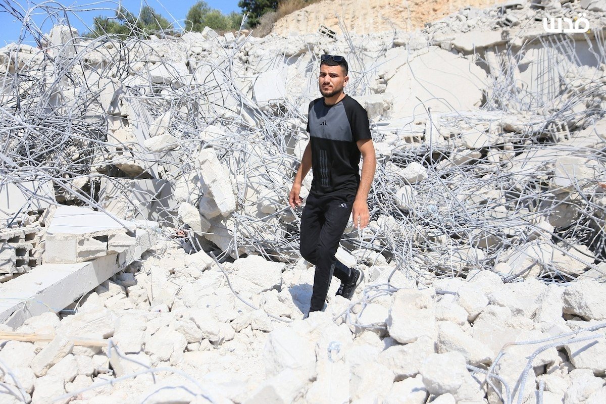 Palestinians inspect rubble after Israeli bulldozers raze home in Anza, Jenin