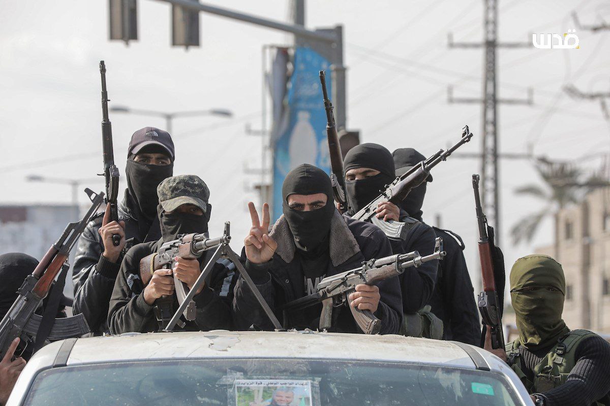 Palestinian resistance fighters parade in Gaza after Israeli withdrawal