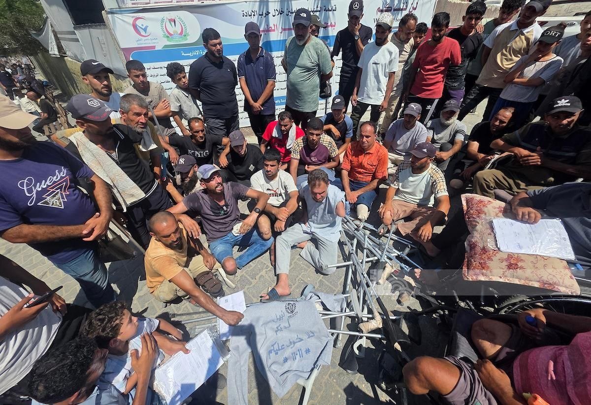 Wounded Palestinians protest at Nasser Medical Complex in Khan Younis