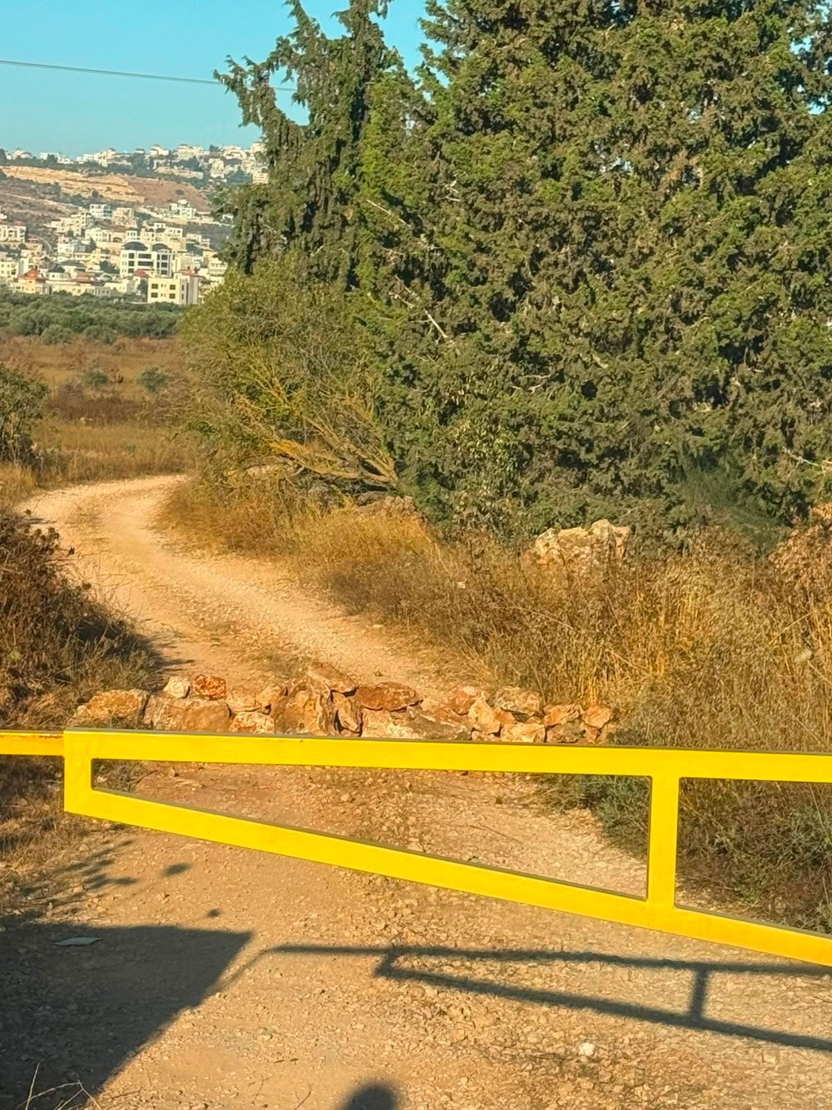 Israeli settlers block road to Abu Awwad family home in Turmus Ayya