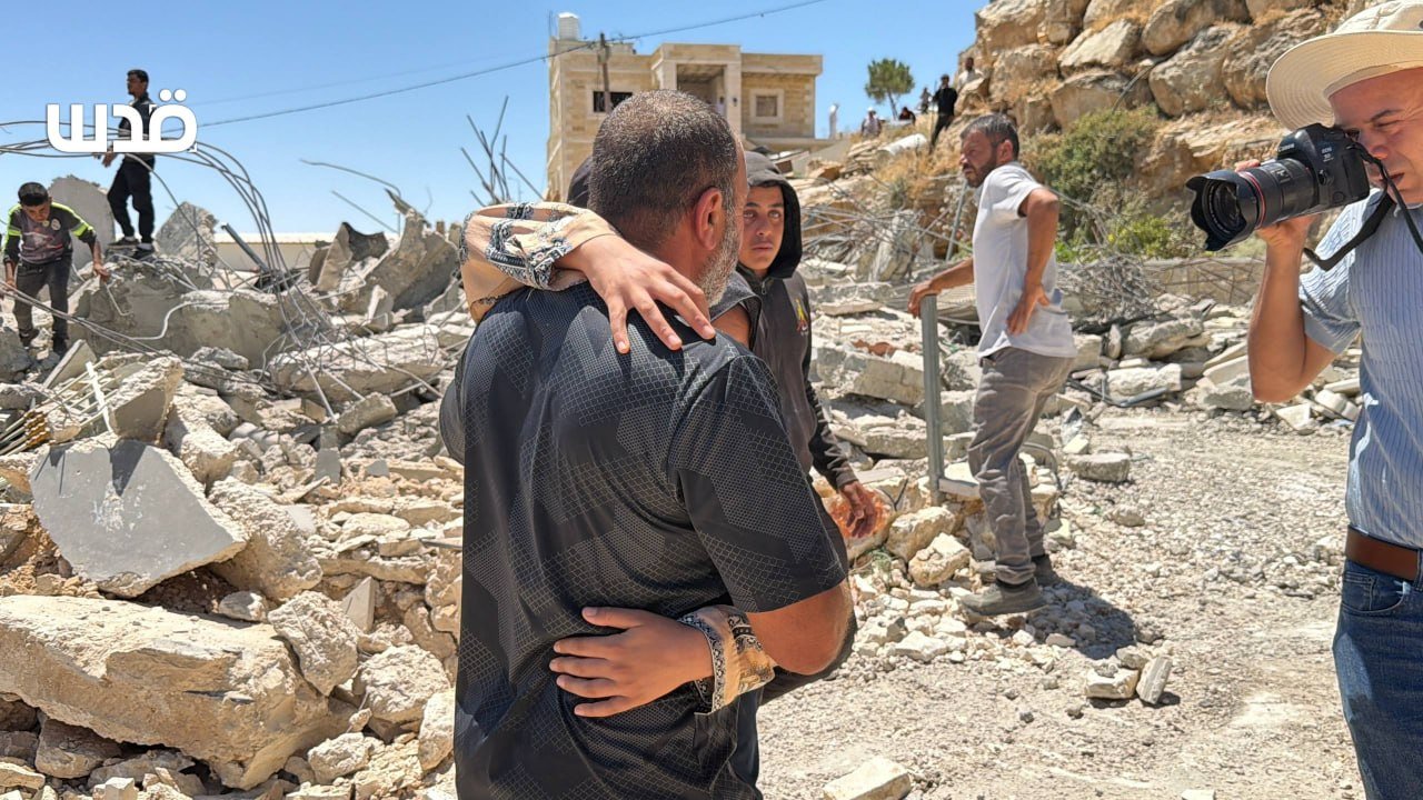 Palestinian family inspects home demolished by Israeli forces in West Bank